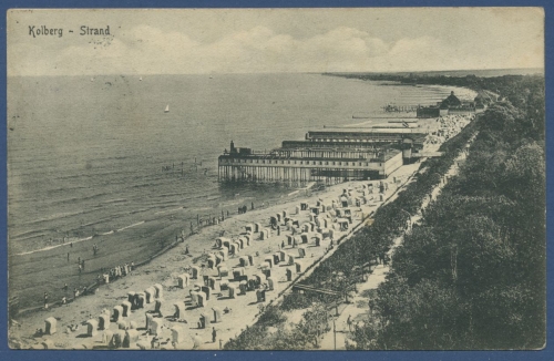 Kolberg Strand mit Seebrücke, gelaufen Marke fehlt (AK1265)