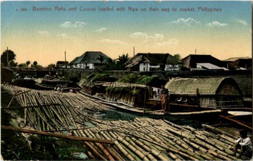 Bamboo rafts an cascos loaded with Nipa Philippines