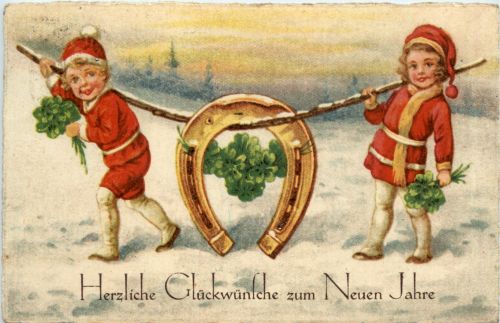 Neujahr - Kinder mit Hufeisen