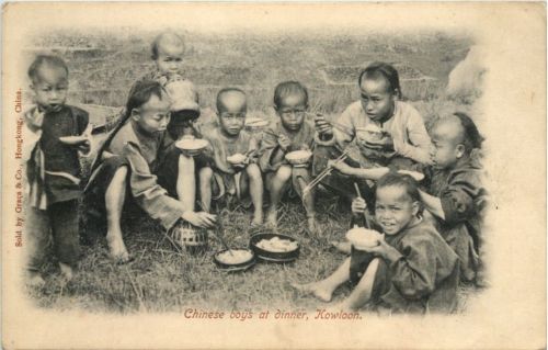 China - Kowloon - Chinese boys at dinner