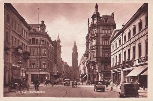 Ansichtskarte Krefeld, Rheinstrasse mit Passanten und Autos