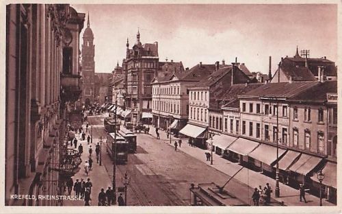 Ansichtskarte Krefeld, Blick in die Rheinstraße mit Straßenbahn