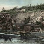 A steam Shovel in the Canal during a Flood - Panama