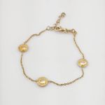 Vergoldetes Silberarmband mit runden Zierelementen