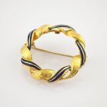 Vintage-Brosche aus Gold mit Emaille