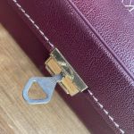 Münzkassette weinrot mit 5 Tableaus und Schlüssel / neuwertig