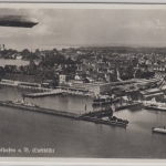 Baden-Württemberg - Friedrichshafen, Luftbild m. Zeppelin, sw-Fotokarte ca. 1930