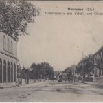 Elsass - Wanzenau (KOS) Hauptstraße, Schul- und Gemeindehaus sw-AK gelaufen 1915