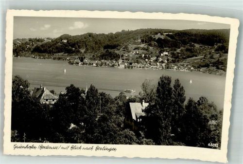 8267 Berlingen Foto AK Panorama des Ortes mit Ev. Kirche Notopfermarke
