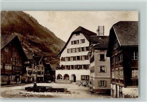 6484 Wassen UR 1914 Gebrauchsspuren Dorfplatz, Brunnen, Postamt , Hotel z. Ochsen AK Eckknick