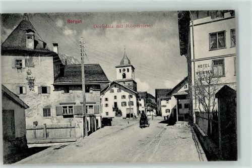Bergün Dorfplatz Römertrum Hotel weisses Kreuz Kutsche Uhr