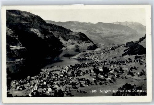 Lungern Kirche, Ortsansicht mit See und Pilatus