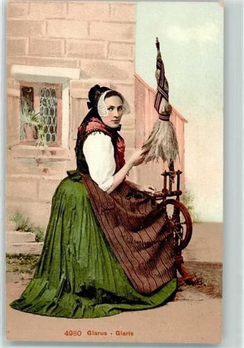 Glarner Trachtenfrau am Spinnrad
