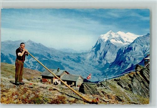 Grindelwald Alphornbläser Joueur de Cor des Alpes et la Vallee de Grindelwald