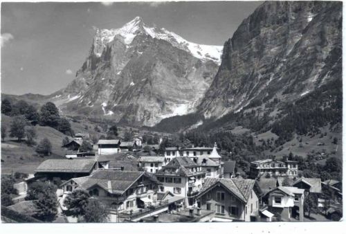 um 1950/60 - Grindelwald, Kanton Bern, Schweiz, Dorfpartie mit Wetterhorn,Gyger & Klopfenstein AKU1