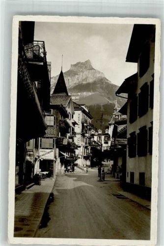 6390 Engelberg Foto AK Hotel Dorfstrasse mit Hahnen
