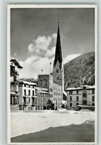 7260 Davos Dorf - Postplatz mit Rathaus und Kirche St. Johann Winteraufnahme