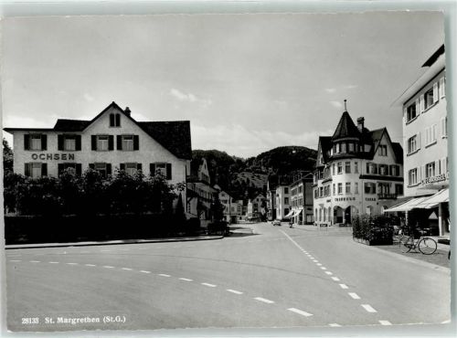9430 St. Margrethen SG Foto AK Gasthaus Ochsen Coiffeur Fahrrad Auto