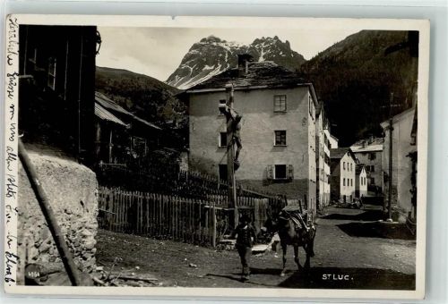 3961 St-Luc - Kreuz Mann mit beladenem Pferd