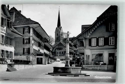 3360 Herzogenbuchsee 1939 Foto AK Kirche Denkmal Brunnen Geschäft