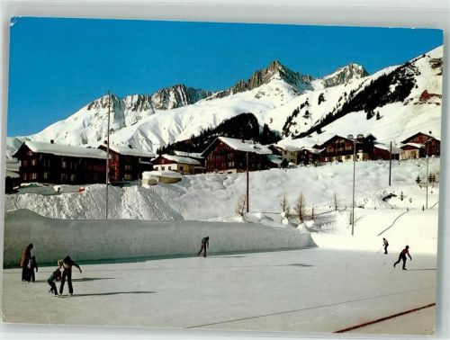 7188 Sedrun Winter Eisplatz mit Crispalt Piz Nair