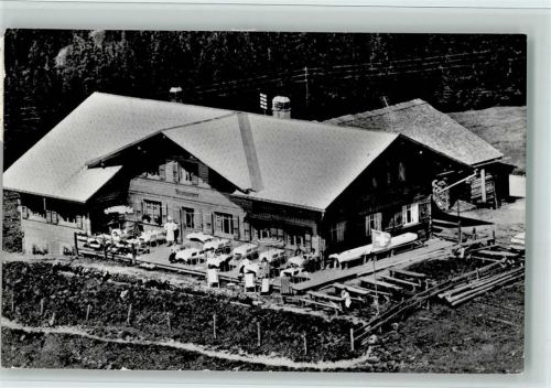 3775 Lenk im Simmental 1964 Foto AK Gasthaus Bühlberg , Koch steht auf der Terrasse