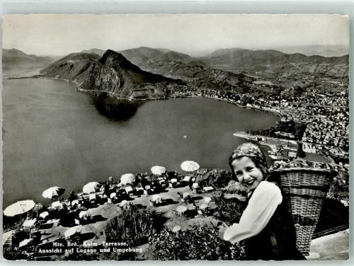 Monte Bré - Kulm Terrasse Mädchen mit Tragekorb