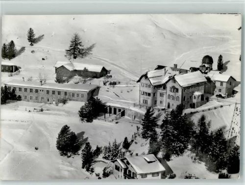 7500 St. Moritz - Luftaufnahme Evangel. Heimstätte Randolins Winteraufnahme