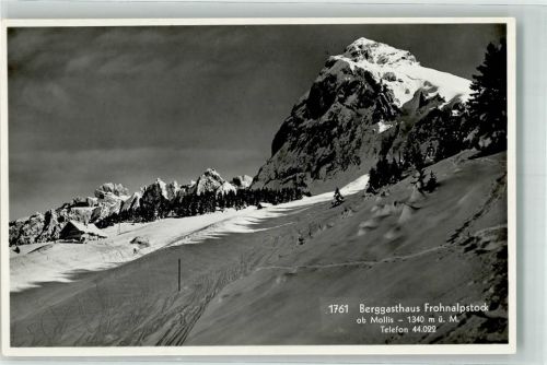 8753 Mollis Foto AK Gasthaus Frohnalpstock Hüttenstempel Winter