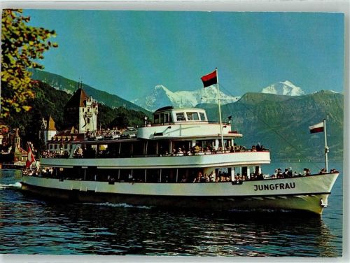 Motorschiff Jungfrau auf dem Thunersee mit Eiger Mönch und Jungfrau Fotograf Gyger Binnenschiff Foto AK