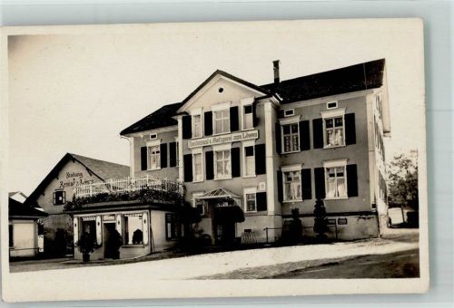 9244 Niederuzwil 1934 Foto AK Gasthaus und Metzgerei zum Löwen Ort handschriftlich