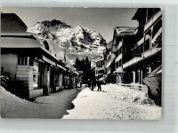 3823 Wengen Winter Dorfstrasse mit Jungfrau