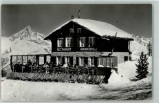 Grächen Gasthaus Hannighusli Winter Schnee Liegestuhl Hannigalp Bietschhorn