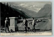 Klausenstrasse - Klausenstrasse, Grenzstein Zwischen Uri und Glarus , Bauern mit Hunden, gute Erhaltung AK