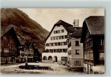 6484 Wassen UR 1914 Gebrauchsspuren Dorfplatz, Brunnen, Postamt , Hotel z. Ochsen AK Eckknick