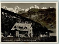 Schwanden Pension Blumenberg mit Eiger Mönch und Jungfrau