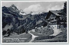 Braunwald Pension Bergfrieden mit Ortstock und hoher Turm
