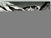 Silvaplana Julier Passhöhe mit den beiden Römersäulen und Piz Surly Winter
