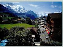 Wengen Sommer- und Winterkurort Die Dorfstrasse mit Jungfrau Grosshorn Breithorn