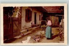 Le Locle Frau mit Kinderwagen und Hühnern Chocolat Klaus Werbung