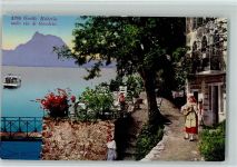 Gandria Ausflugsschiff Junge Frau mit Gitarre Grotto Helvetia