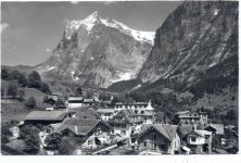 um 1950/60 - Grindelwald, Kanton Bern, Schweiz, Dorfpartie mit Wetterhorn,Gyger & Klopfenstein AKU1