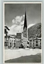 7260 Davos Dorf - Postplatz mit Rathaus und Kirche St. Johann Winteraufnahme