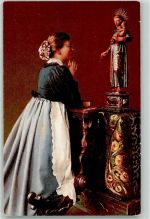 Mädchen beim anbeten der Madonna