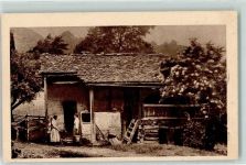 2400 Le Locle 1913 - Bauer sitzt vor dem Haus Chocolat Klaus Werbung