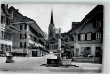 3360 Herzogenbuchsee 1939 Foto AK Kirche Denkmal Brunnen Geschäft