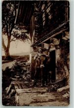 8784 Braunwald - Bauer mit Kuh auf der Alp