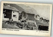Pferde-Transportkolonne in einem Schweizer Bergdorf Klaus Schokolade Werbe AK