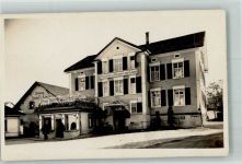 9244 Niederuzwil 1934 Foto AK Gasthaus und Metzgerei zum Löwen Ort handschriftlich