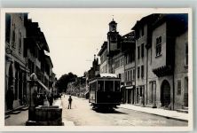 1180 Rolle Foto AK Grand Rue Straßenbahn Brunnen